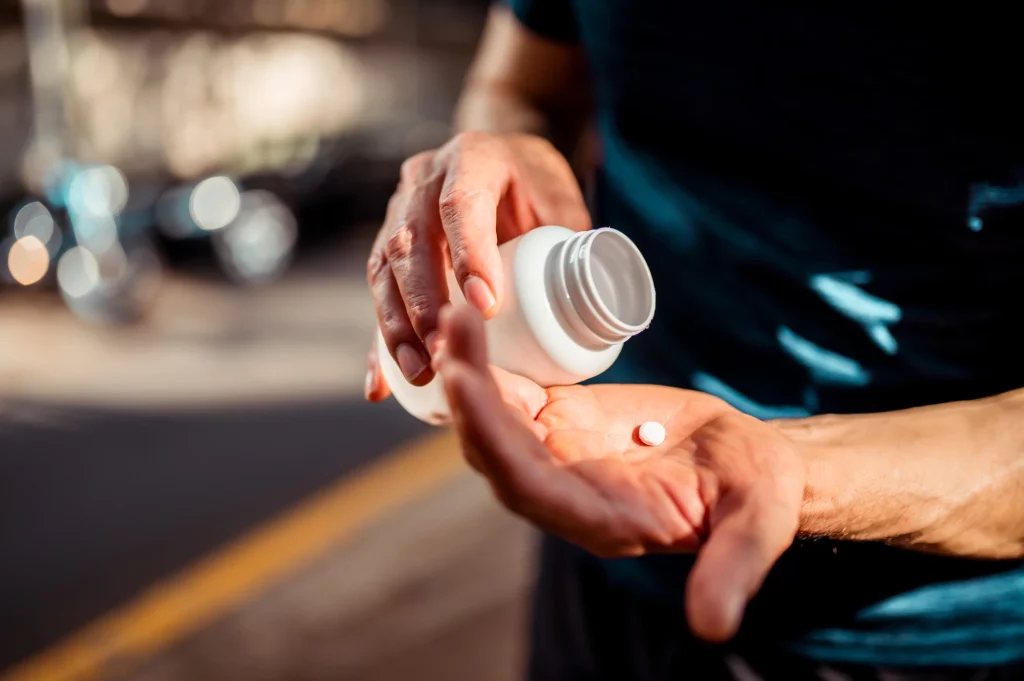 guy taking pills
